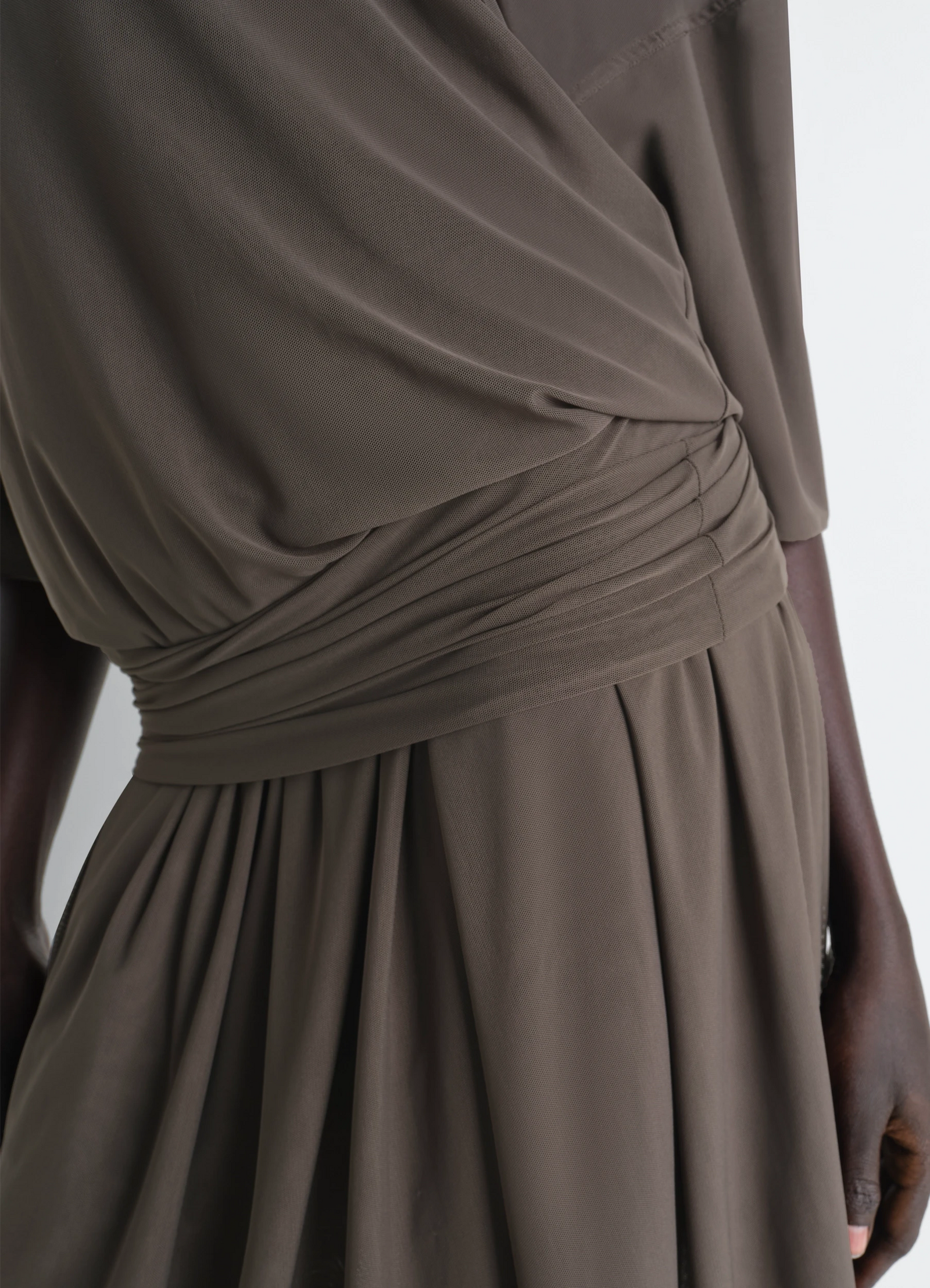 Double layer dress in mesh in transparent mesh, model shot, close-up side view folded waist detail