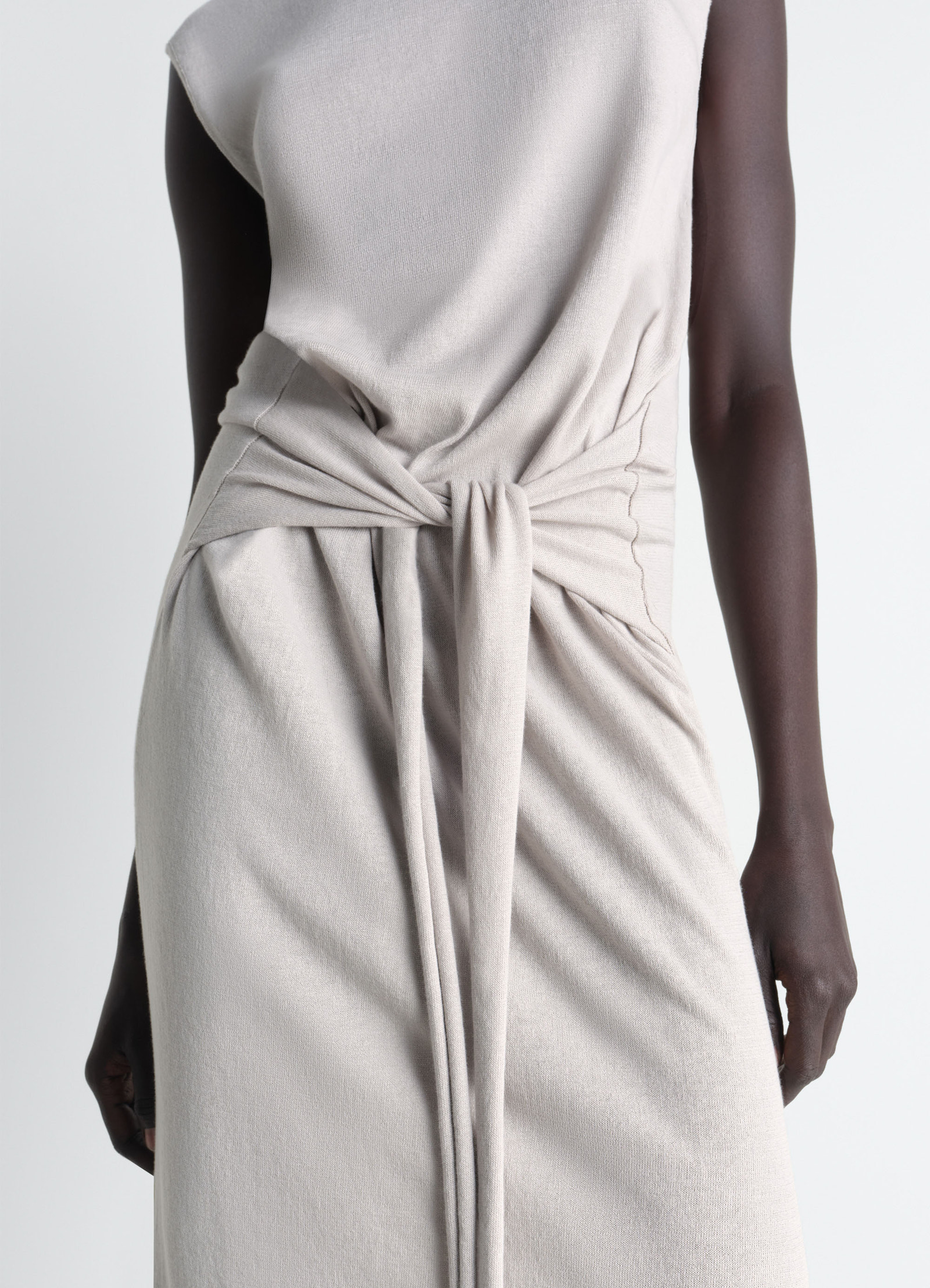 Sleeveless knotted dress in fine cotton crepe, model shot, close-up front detail waist knot detail focus