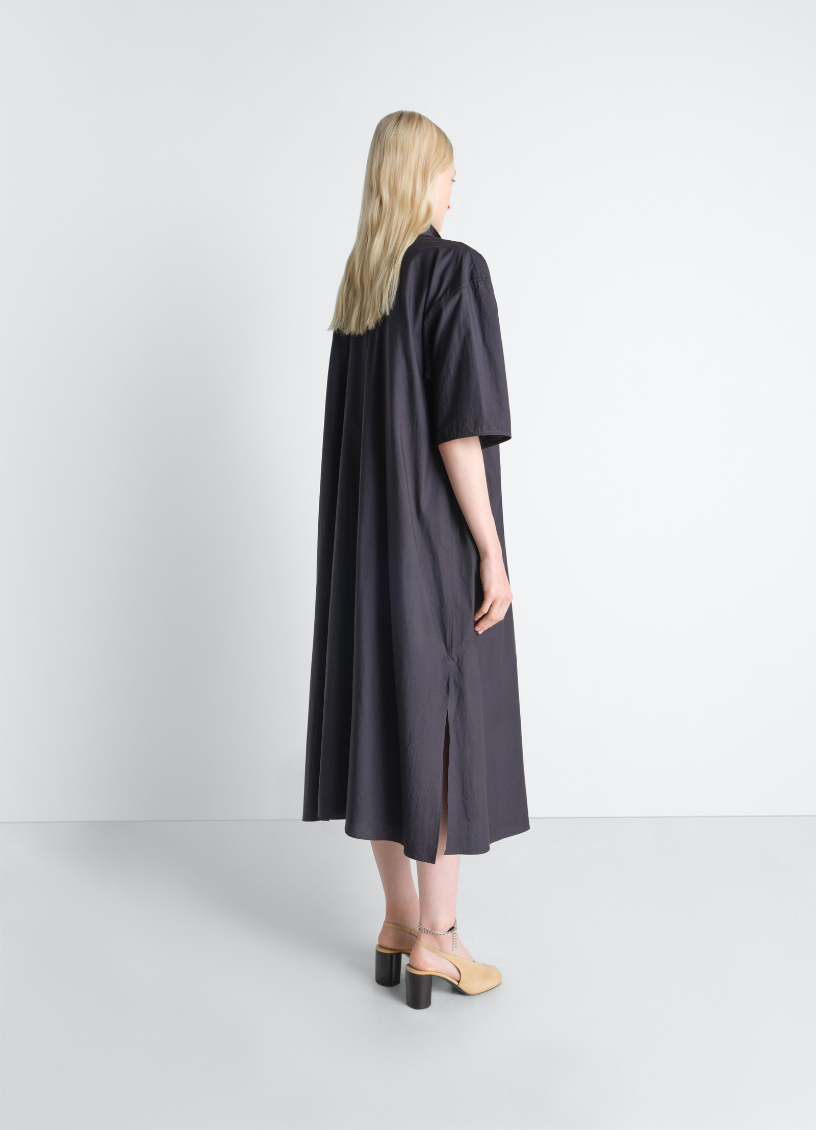 Reversible tube dress in washed cotton silk, model shot, rear three-quarter view loose fit short sleeve, side slit