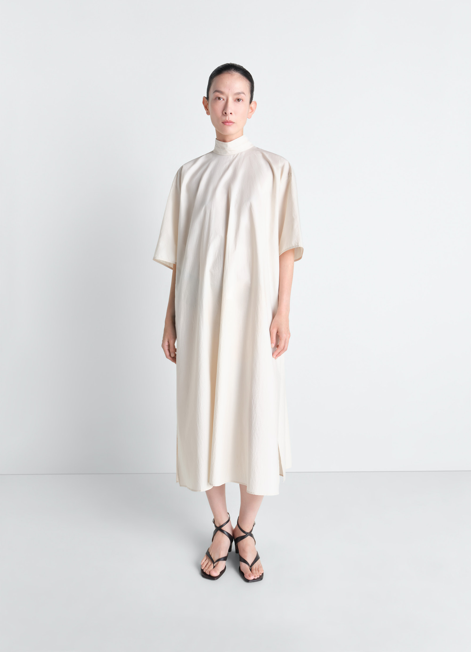 Reversible tube dress in washed cotton silk, model shot, three-quarter front view flowy fit with high neckline