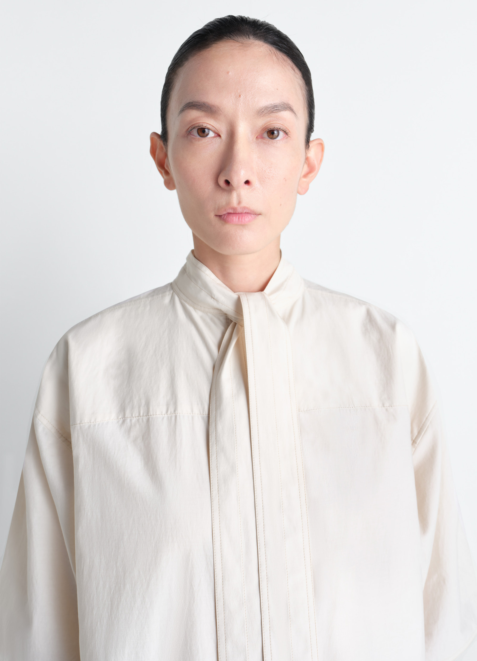 Reversible tube dress in washed cotton silk, model shot, close-up front view minimal collar detail