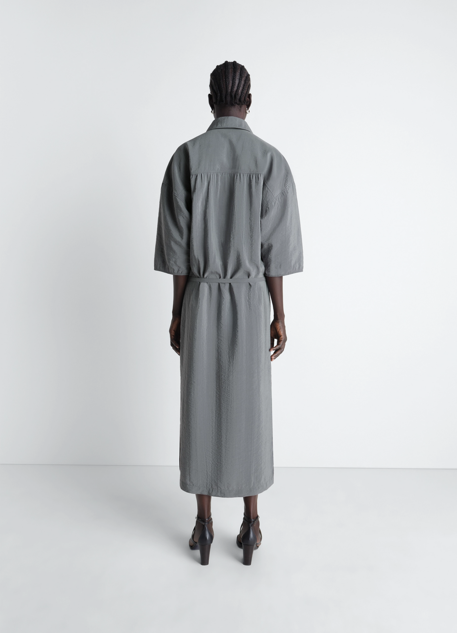 Lemaire asymmetrical shirt dress in dry silk, model shot, back view gathered waist, relaxed fit