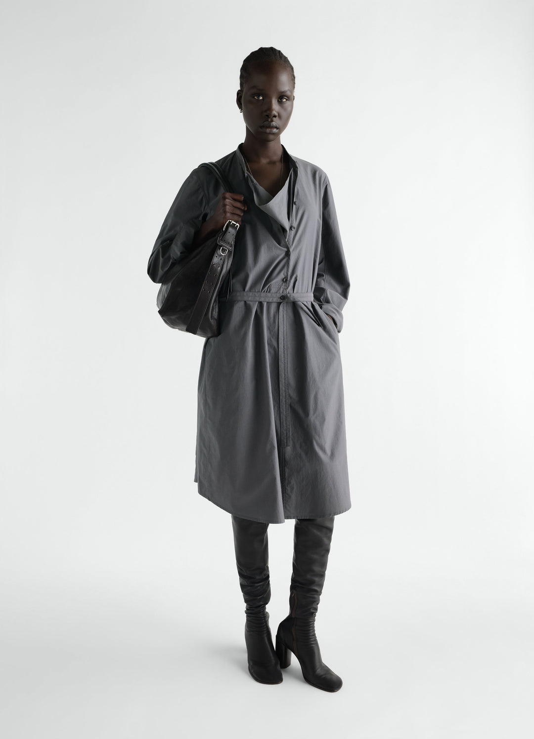 Sailor dress in washed grey cotton silk blend worn by model with black leather boots and shoulder bag LEMAIRE