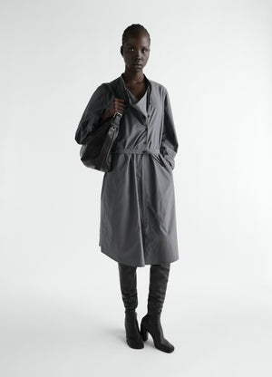 Sailor dress in washed grey cotton silk blend worn by model with black leather boots and shoulder bag lemaire