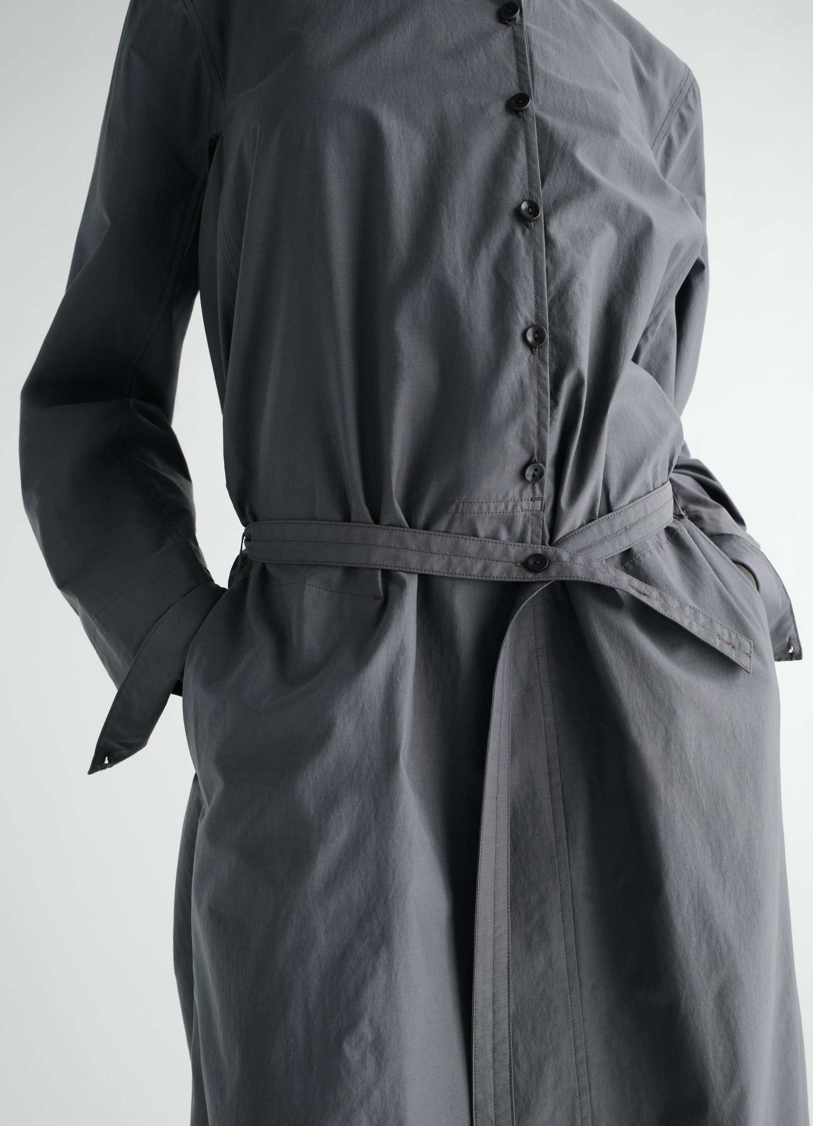 Sailor dress in washed grey cotton silk blend with buttons and belt worn by model lemaire close-up front view
