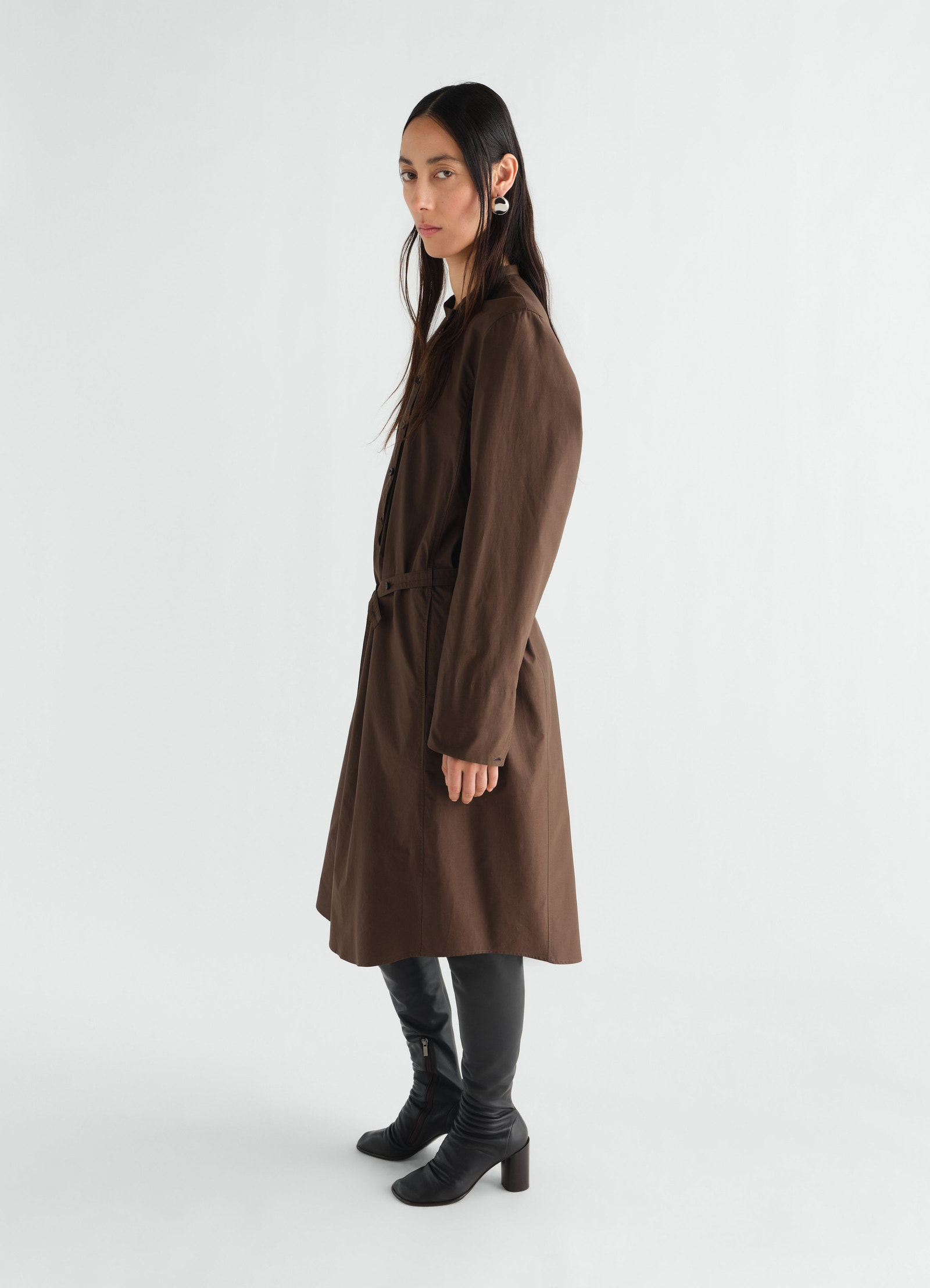 Sailor dress in brown washed cotton silk blend by lemaire worn by model side view with long sleeves