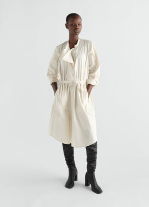 Sailor dress in washed cotton and silk blend cream color with belt worn by model lemaire