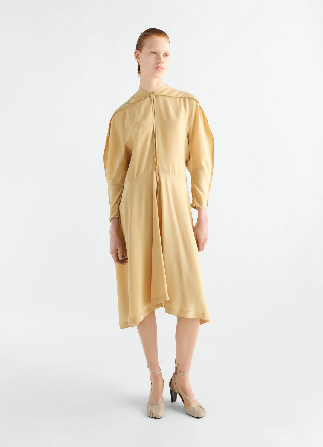 Midi dress in beige silk viscose cloth worn by a model front view LEMAIRE