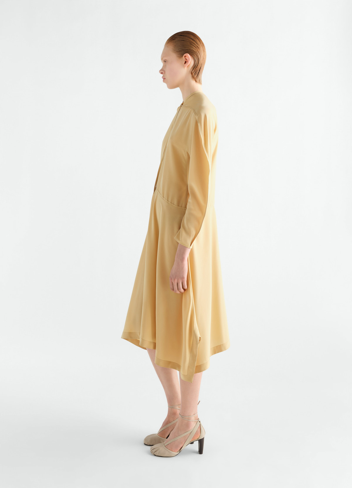 Midi silk and viscose cloth dress in camel by lemaire worn by model side view