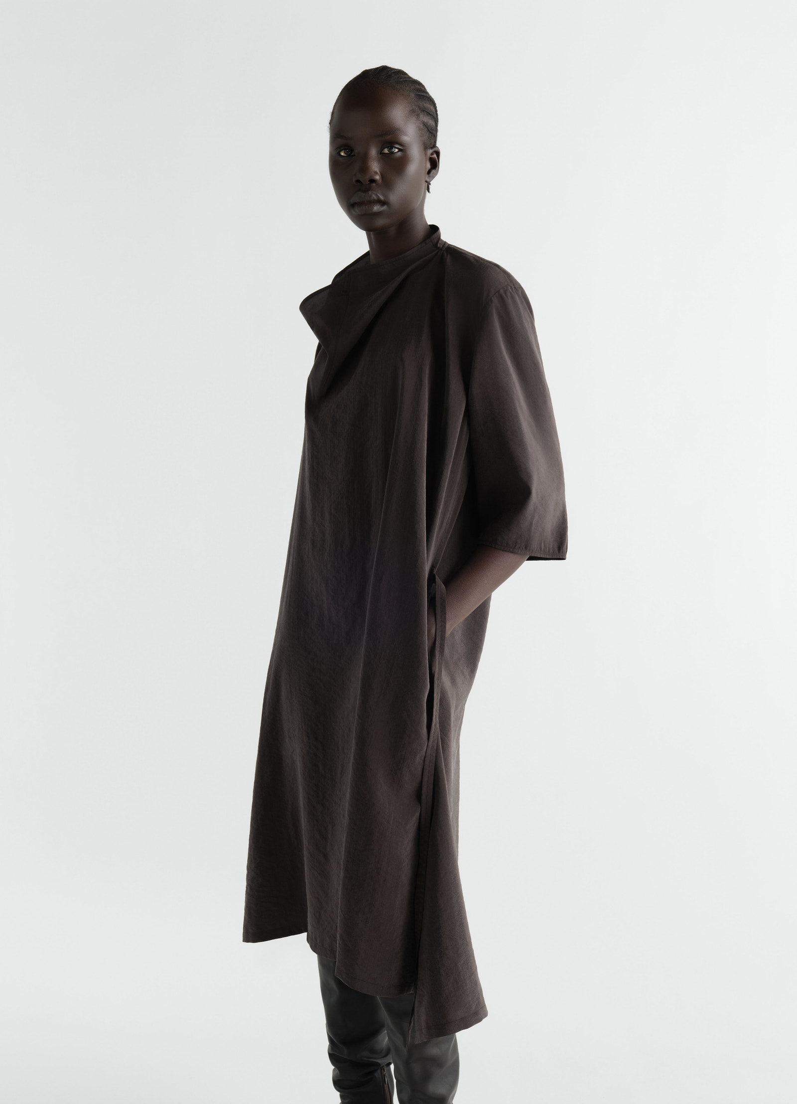 Soft-collar dry silk dark brown dress by lemaire worn by a model front view with side pocket detail