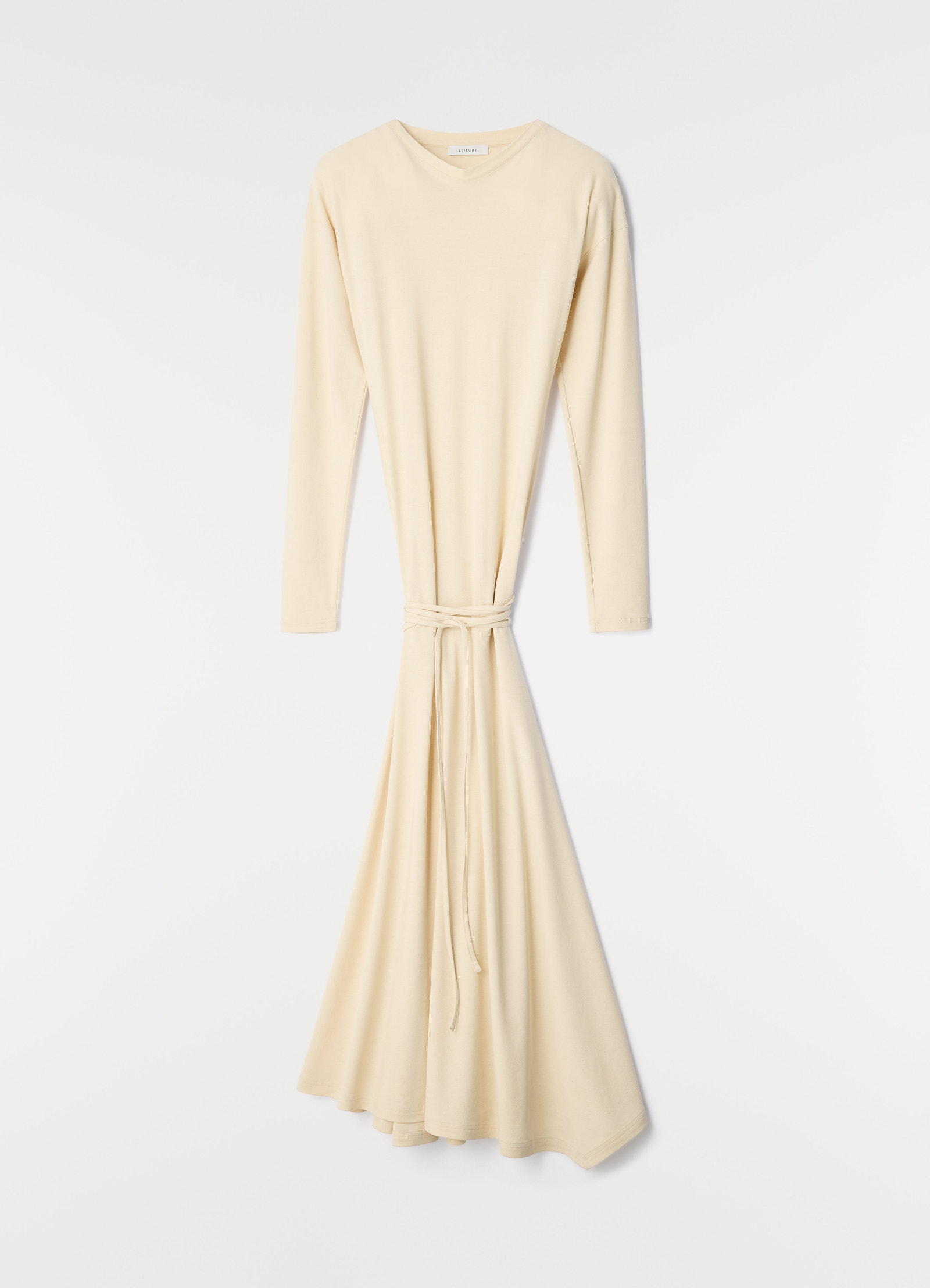 Fluid beige long-sleeve jersey crepe dress with waist tie by lemaire flat lay on white background