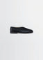 Lemaire Piped Slippers in Black Nappa Lamb Leather, product shot, Side view Classic streamlined shape