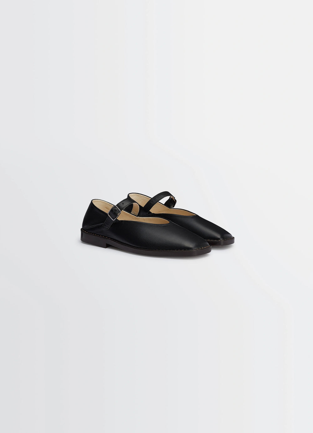 Ballerina Shoes in Black Nappa Lamb Leather, product shot, three-quarter view classic buckle strap