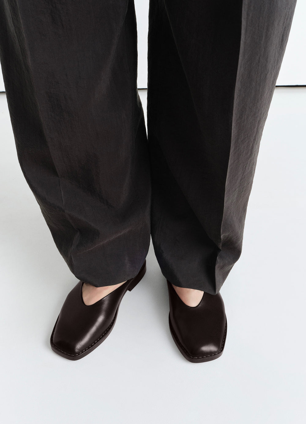 Lemaire Ballerina Shoes in Smooth Lamb Nappa Leather, model shot, top down view square toe design