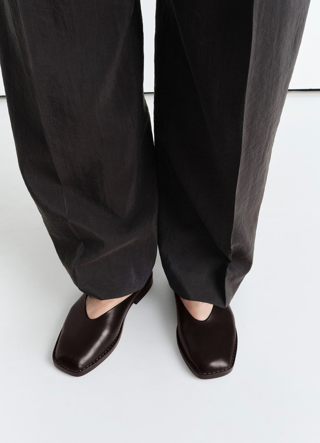 Lemaire Ballerina Shoes in Smooth Lamb Nappa Leather, model shot, top down view square toe design