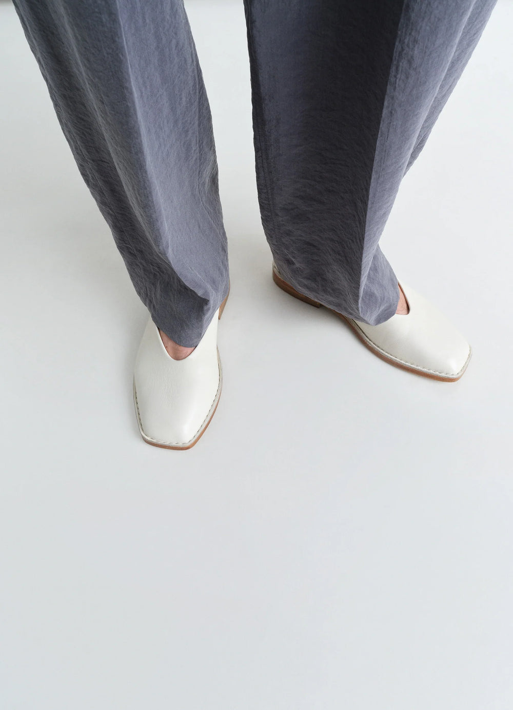 Lemaire Ballerina Shoes in Smooth Lamb Nappa Leather, model shot, top view square toe design