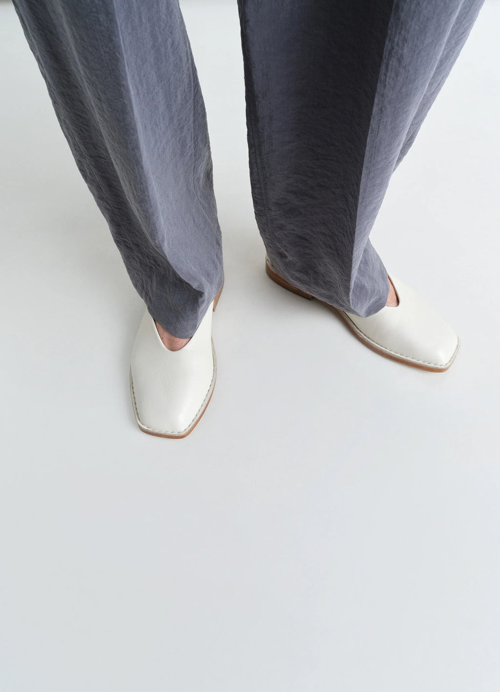 Lemaire Ballerina Shoes in Smooth Lamb Nappa Leather, model shot, top view square toe design