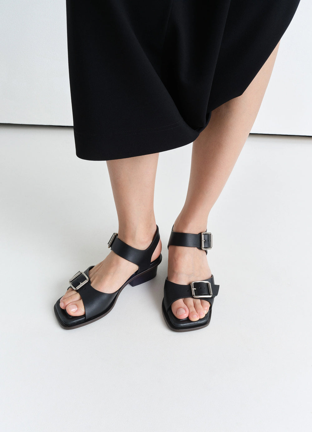 Lemaire Square Heeled Sandals in Smooth Vegetable-Tanned Leather, model shot, top down view buckle fastening