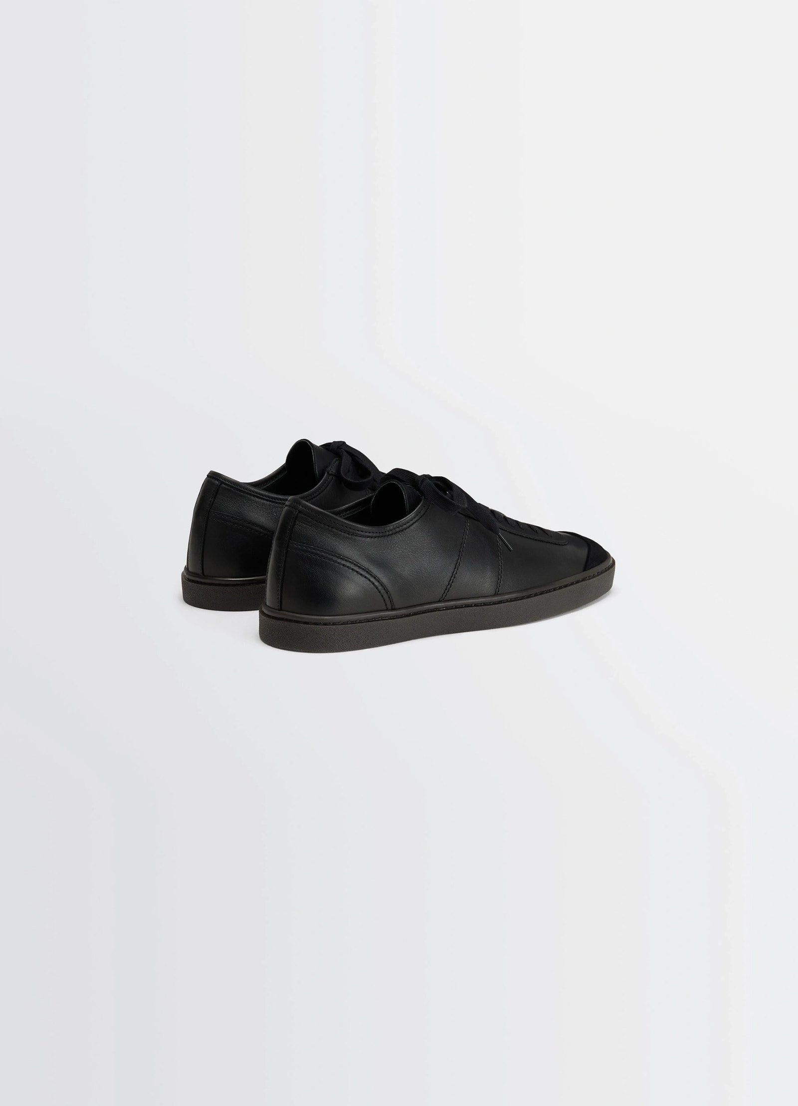 Linoelum basic laced up trainers in black soft cow leather, product shot, rear three-quarter view stitched panels with low pr