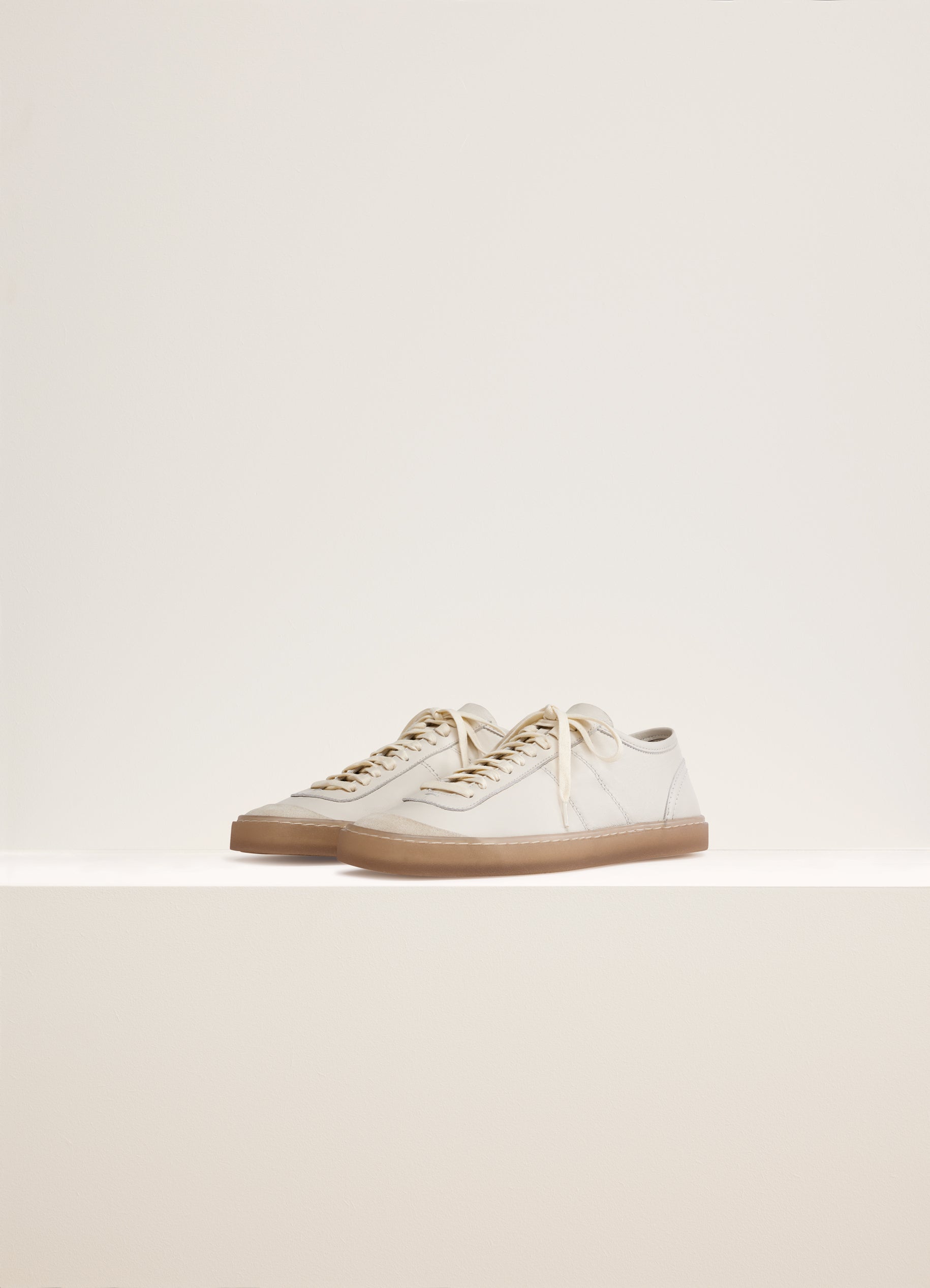 Clay White Linoleum Laced Up Trainers in Soft Leather | LEMAIRE | Sneaker high