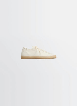 Lemaire Basic Laced Up Trainers in Smooth soft cow leather, product shot, side view suede cutout, square toes