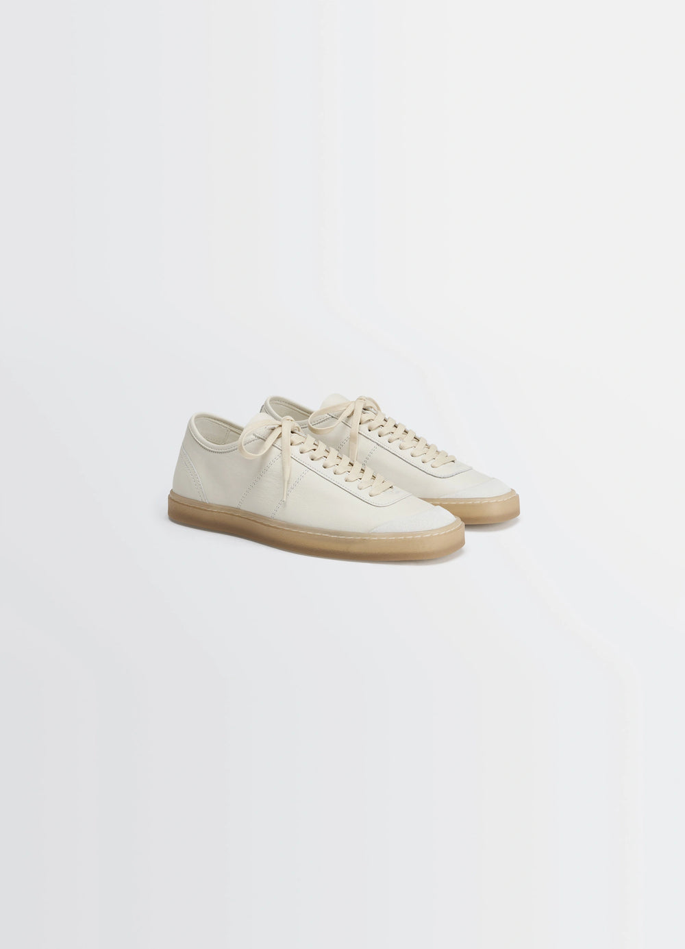Lemaire Basic Laced Up Trainers in Smooth soft cow leather, product shot, angled top view fine grain texture visible