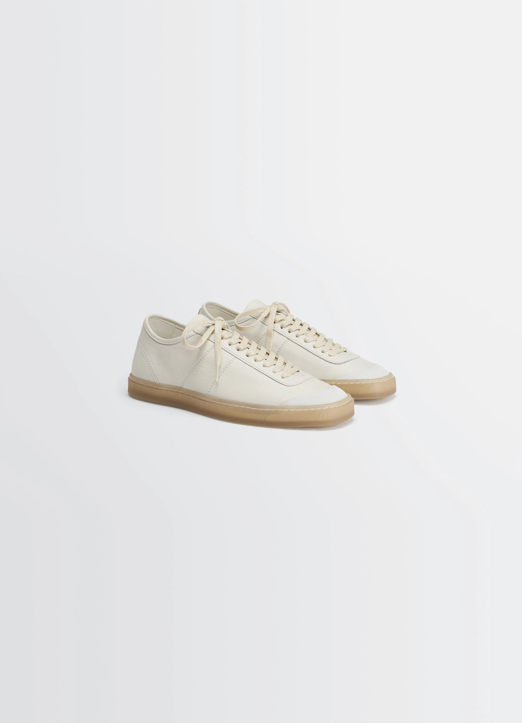 Lemaire Basic Laced Up Trainers in Smooth soft cow leather, product shot, angled top view fine grain texture visible