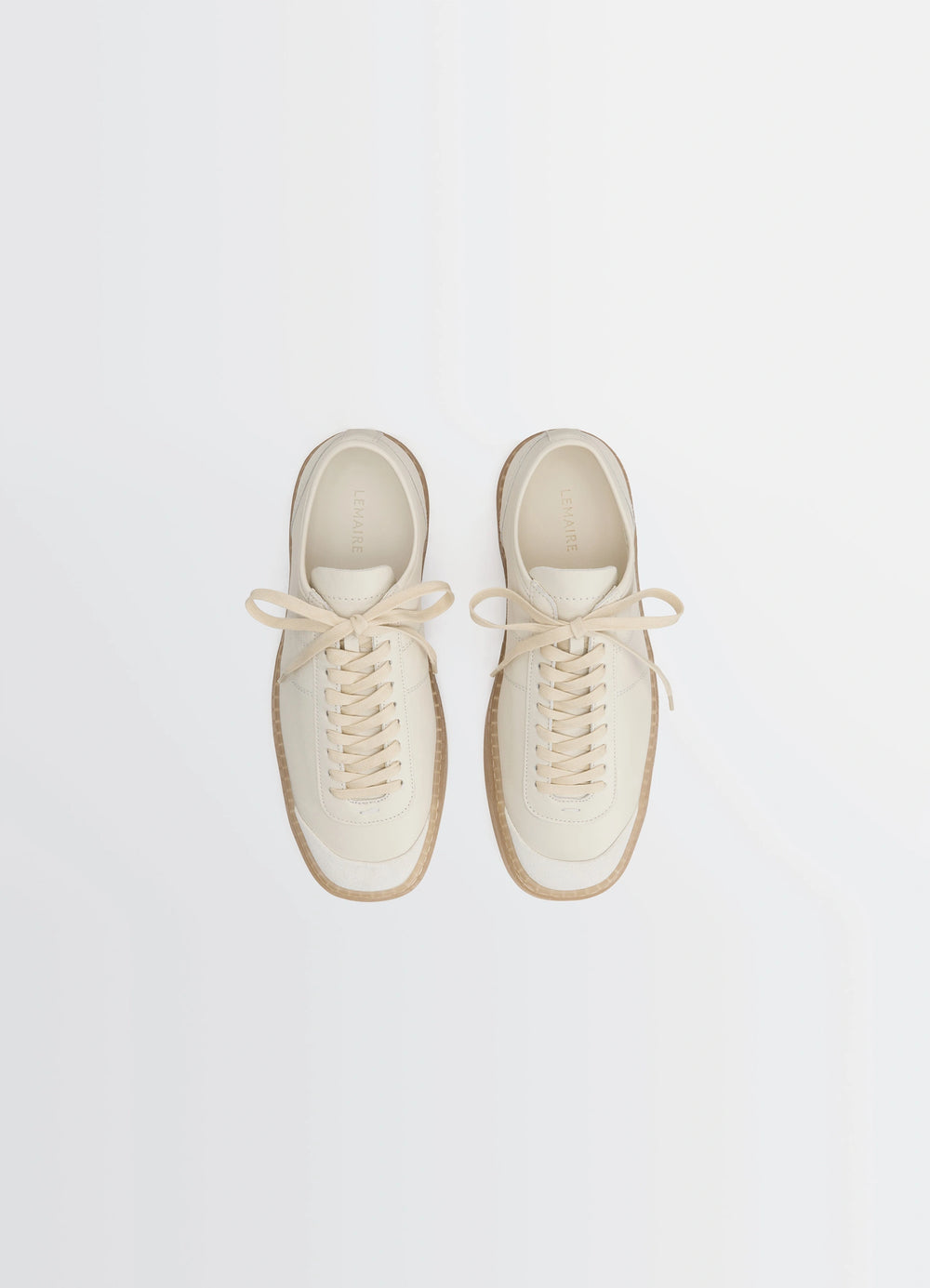 Lemaire Basic Laced Up Trainers in Smooth soft cow leather, product shot, top view neutral laces, branding visible