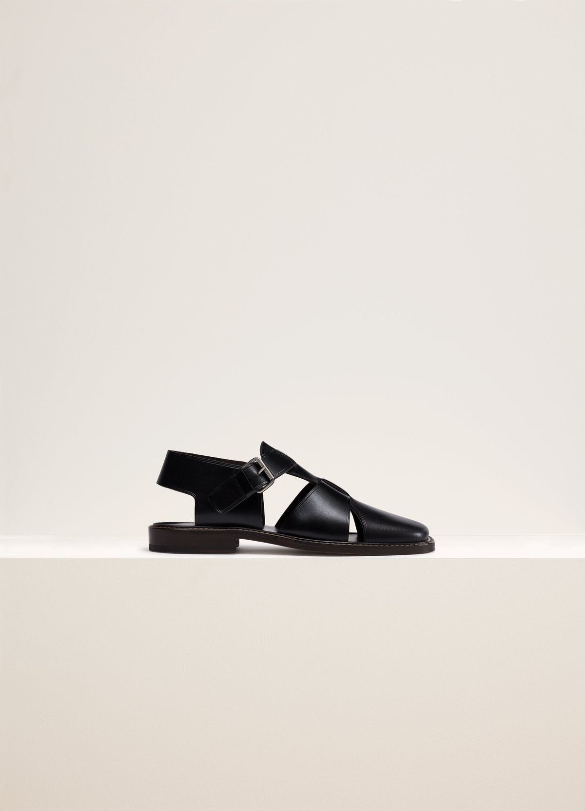 Lemaire Fisherman Sandals in Black Smooth Cow Leather, product shot, Side view Square toe, buckled strap