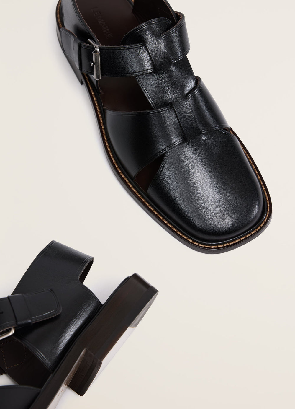 Lemaire Fisherman Sandals in Black Smooth Cow Leather, product shot, overhead detail shot stitching detail, leather texture