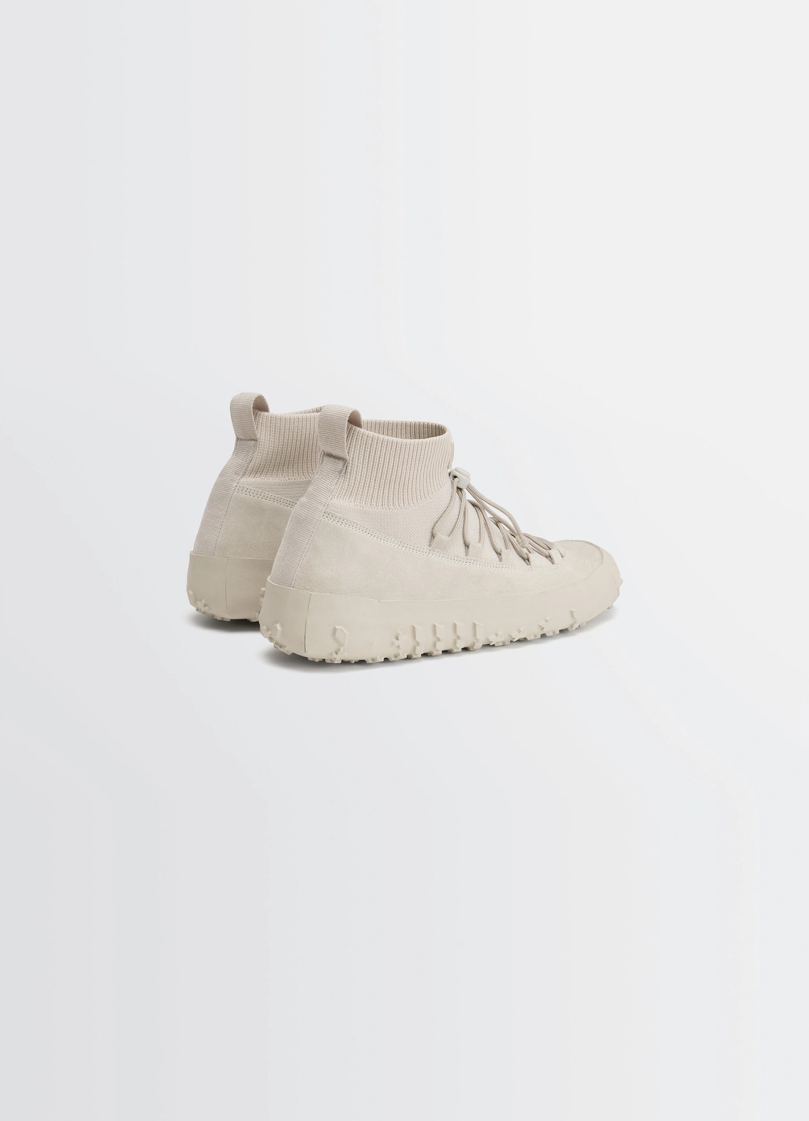 Vibram wrap on sneakers in textured hand-sueded lambskin, product shot, rear three-quarter view ribbed tongue pull loops
