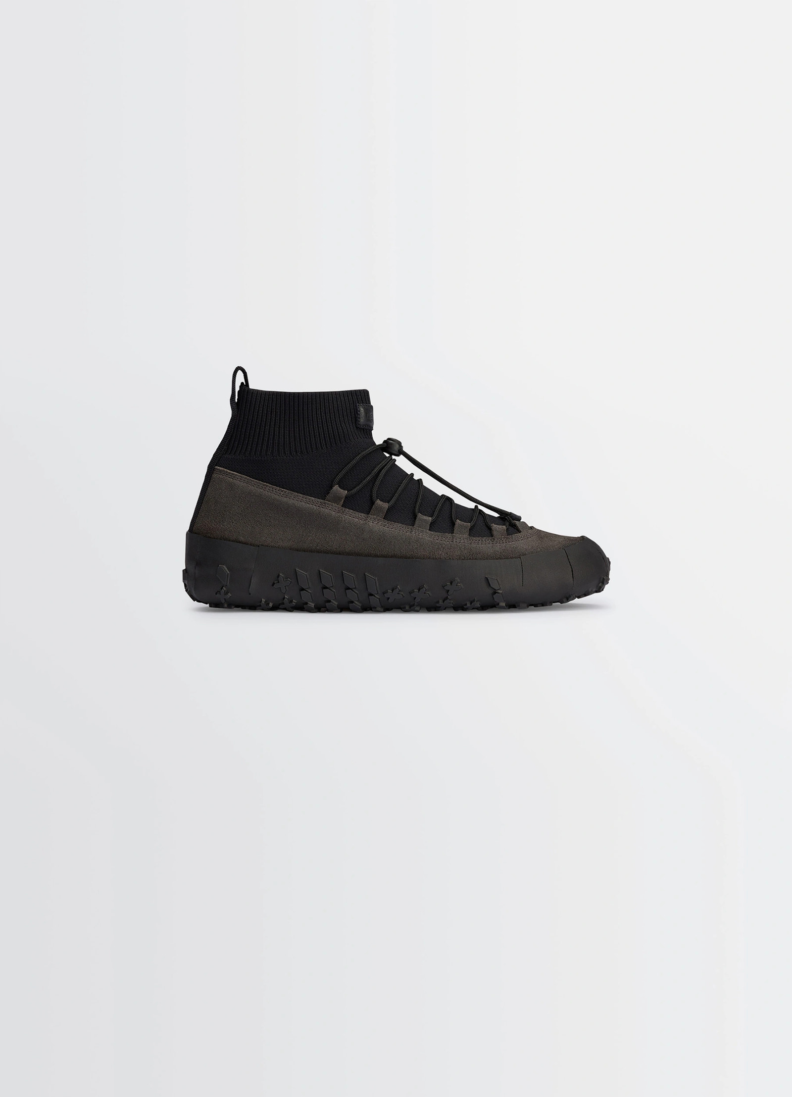 Vibram wrap on sneakers in black supple leather, product shot, side view high-top durable cut