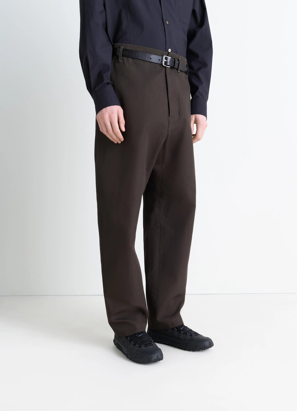 Vibram Wrap On Sneakers in Black Supple Leather, model shot, front view textured sole design