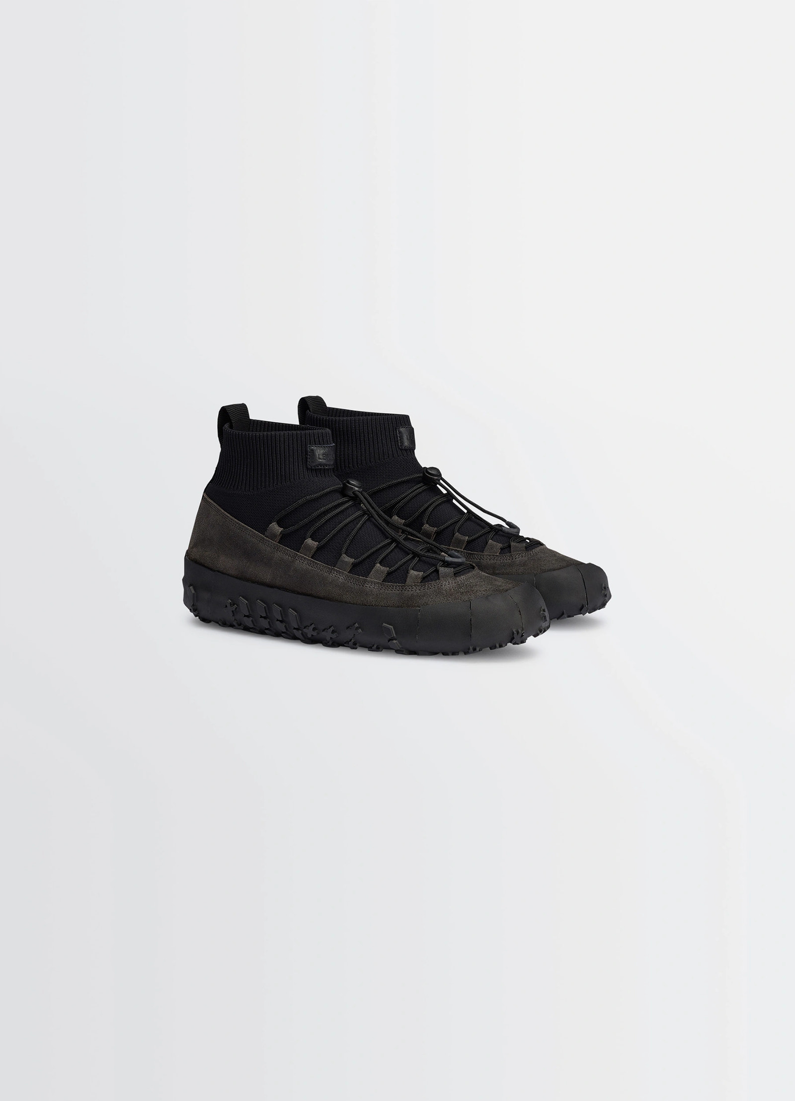 Vibram wrap on sneakers in black supple leather, product shot, three-quarter view ribbed ankle cuff
