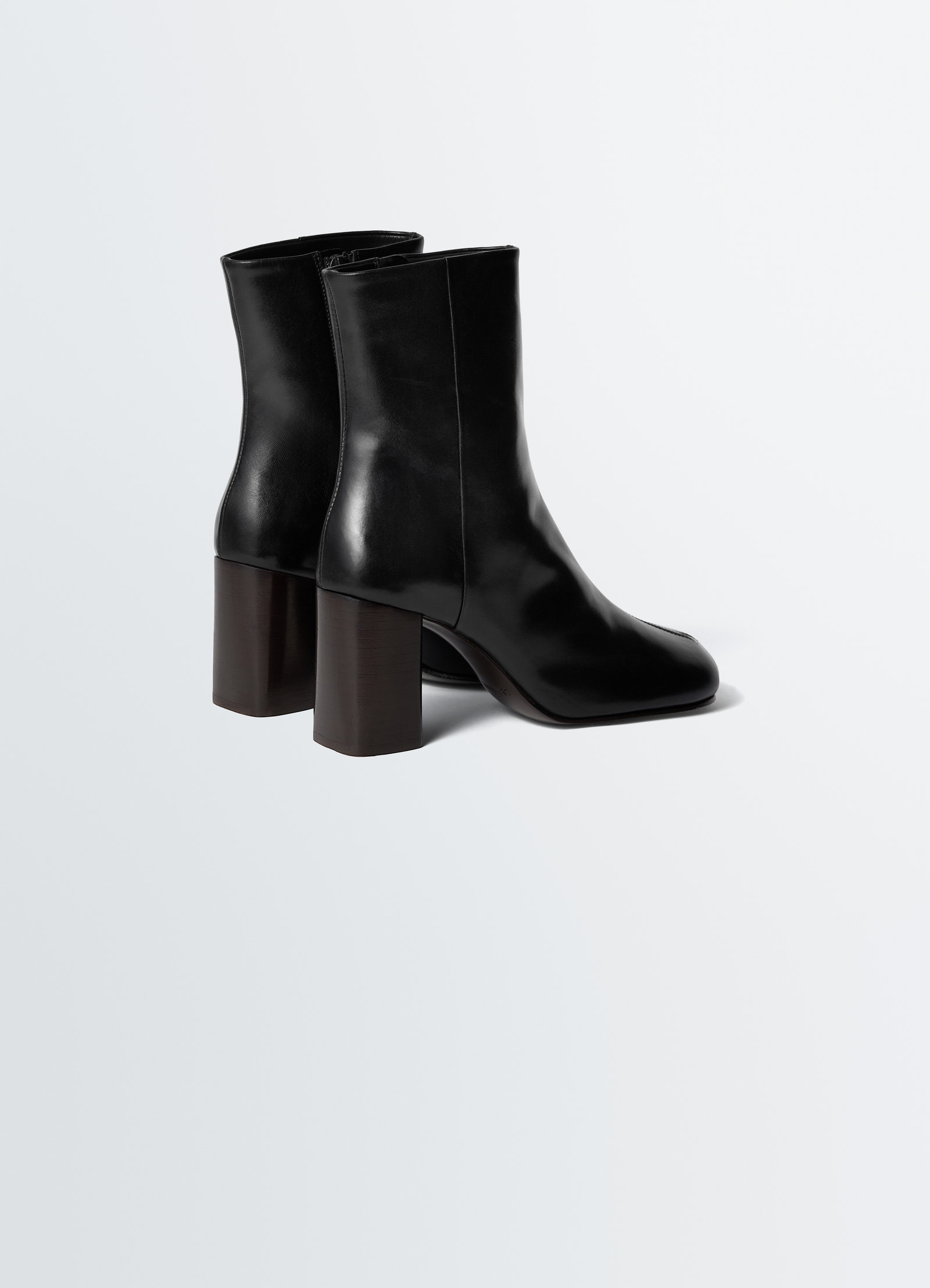 Anatomic black leather boots with 80mm block heel by lemaire side view on white background