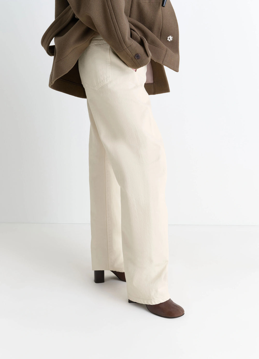 Lemaire Anatomic Boots in Glossy Vegetable-Tanned Leather, model shot, back view worn with wide leg pants