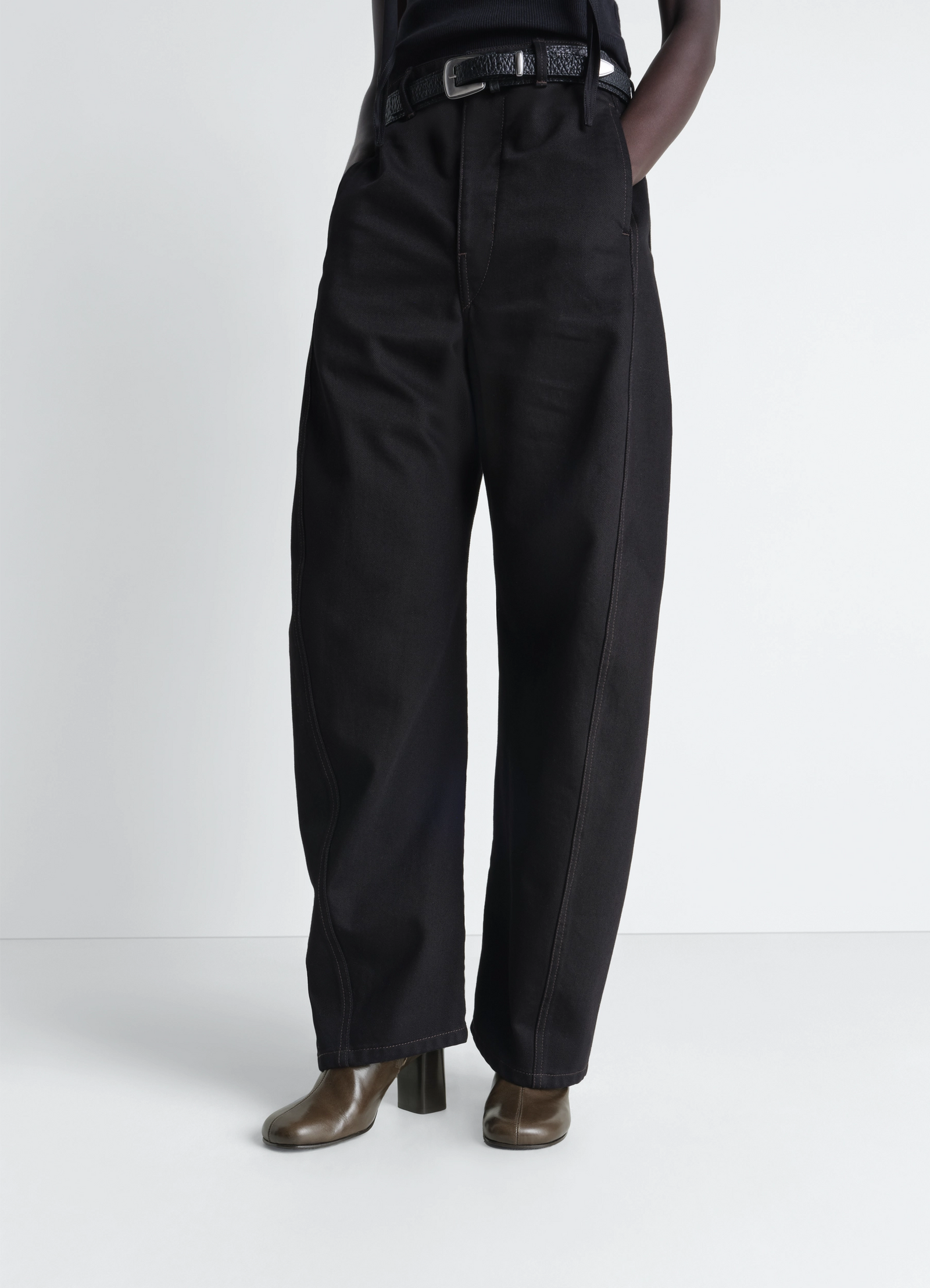 Lemaire anatomic boots in glossy vegetable-tanned leather, model shot, three-quarter view block heel design