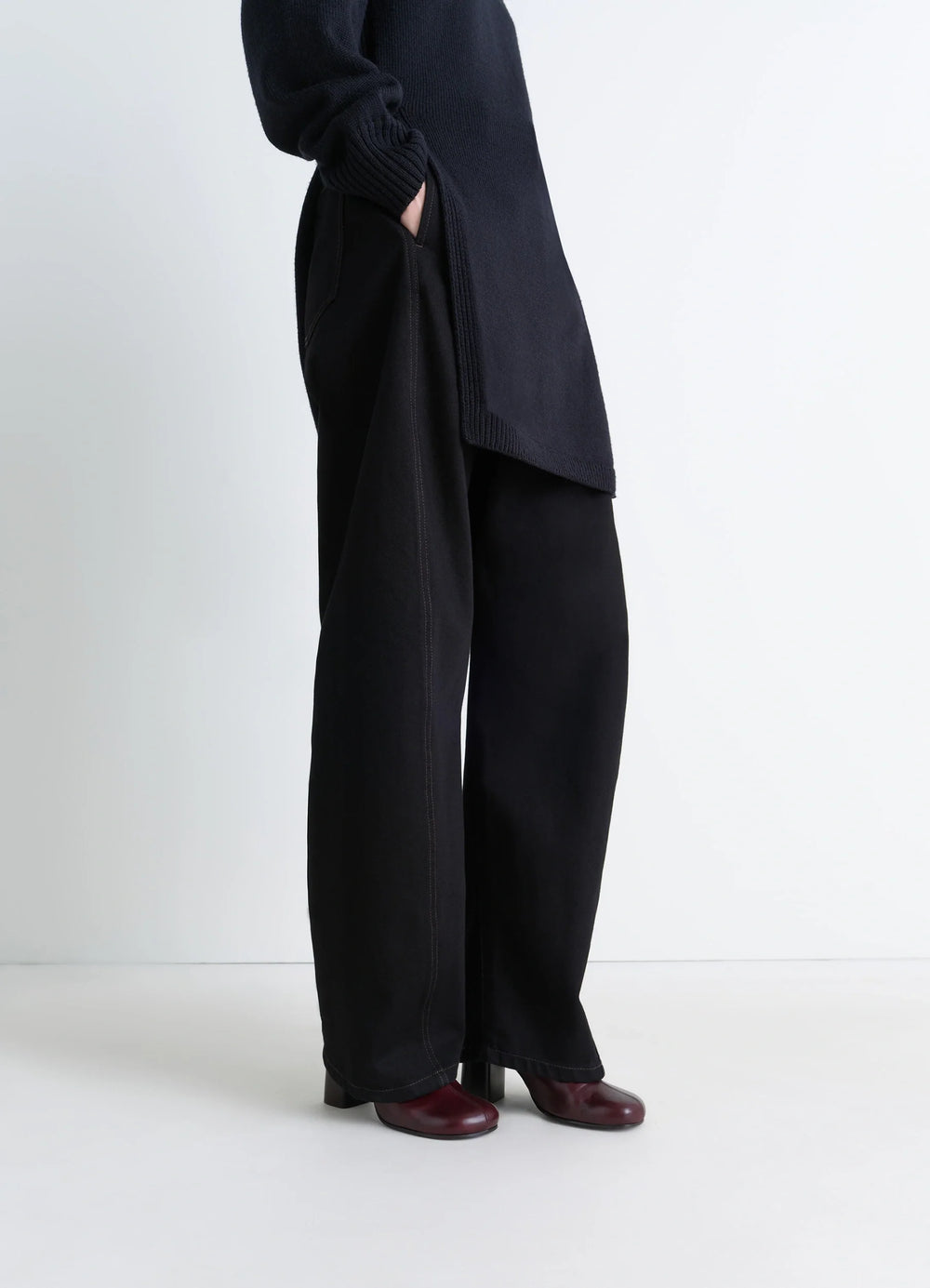 Anatomic Boots 80 in Glossy vegetable-tanned leather, model shot, bottom view wide leg pant overlay