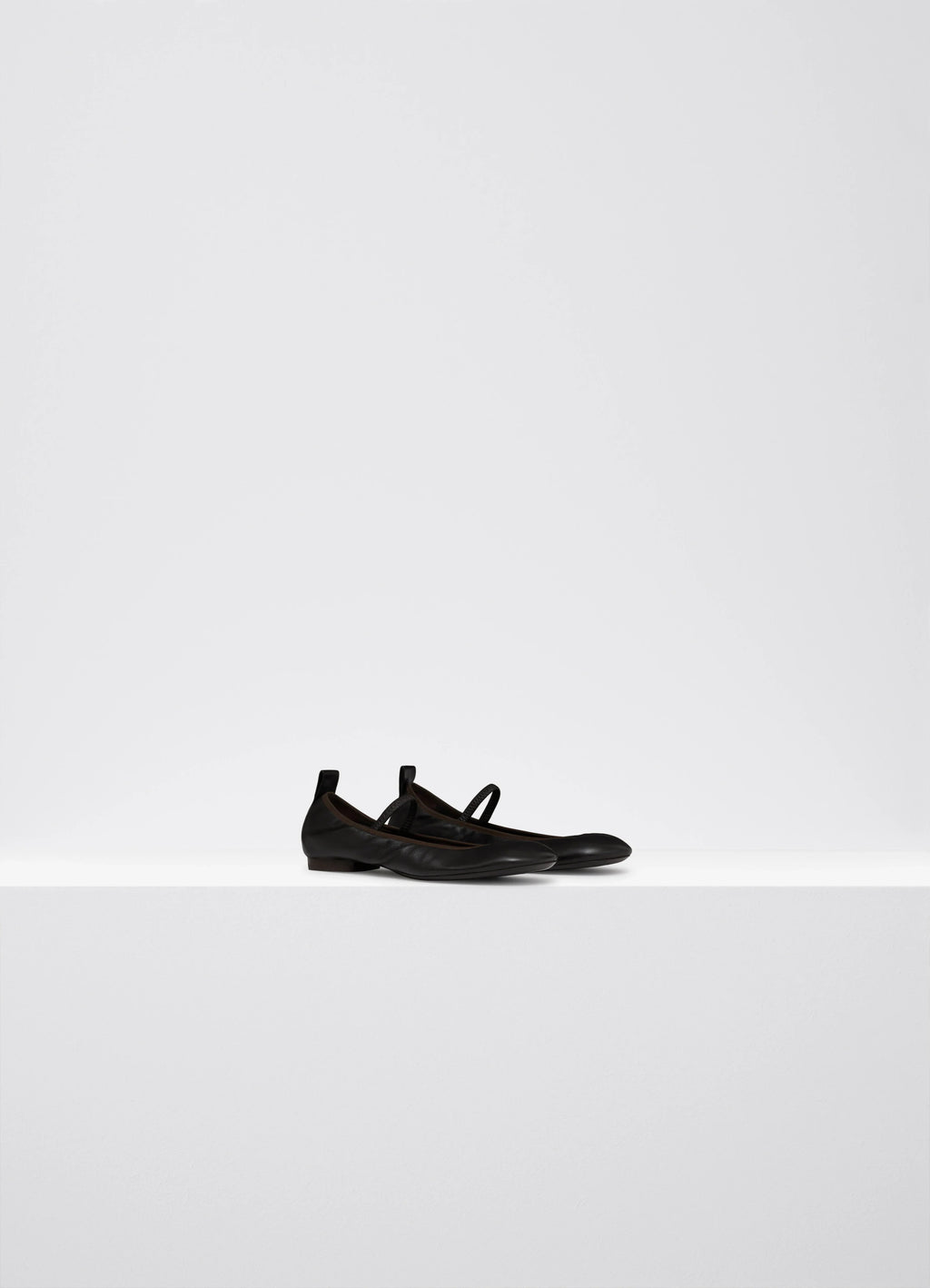 Lemaire Square Flat Ballerina in Black Nappa leather, product shot, angled side view tonal braided strap