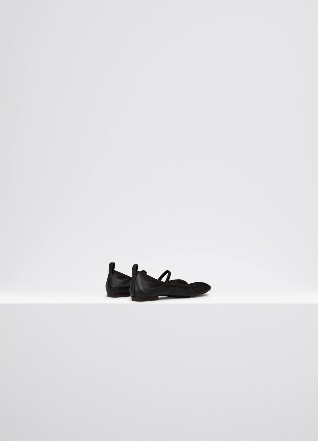 Lemaire Square Flat Ballerina in Black Nappa leather, product shot, back angled view round toe, flat heel