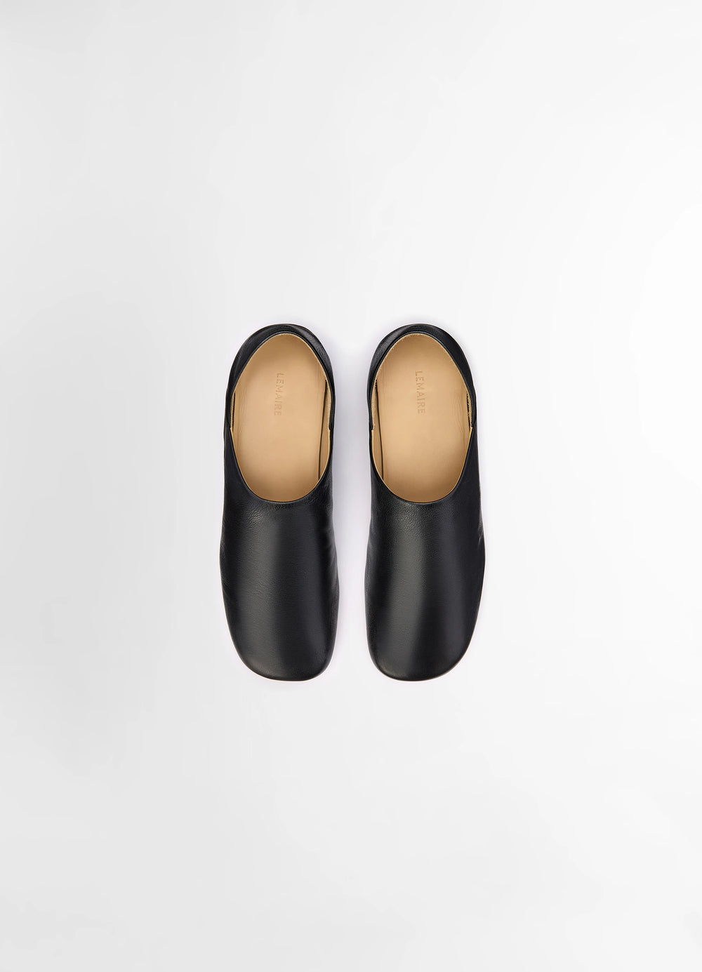 LEMAIRE Slippers in Black Shiny Buffalo Leather, product shot, top view straight toe line