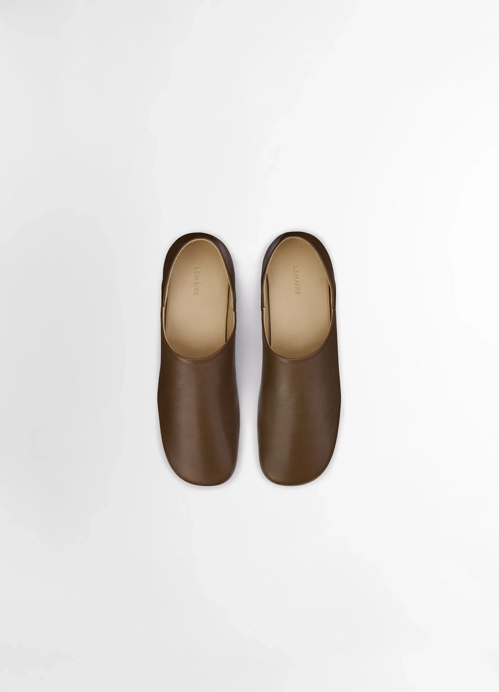 Lemaire Slippers in Shiny Buffalo Leather, product shot, aerial view rounded edge design