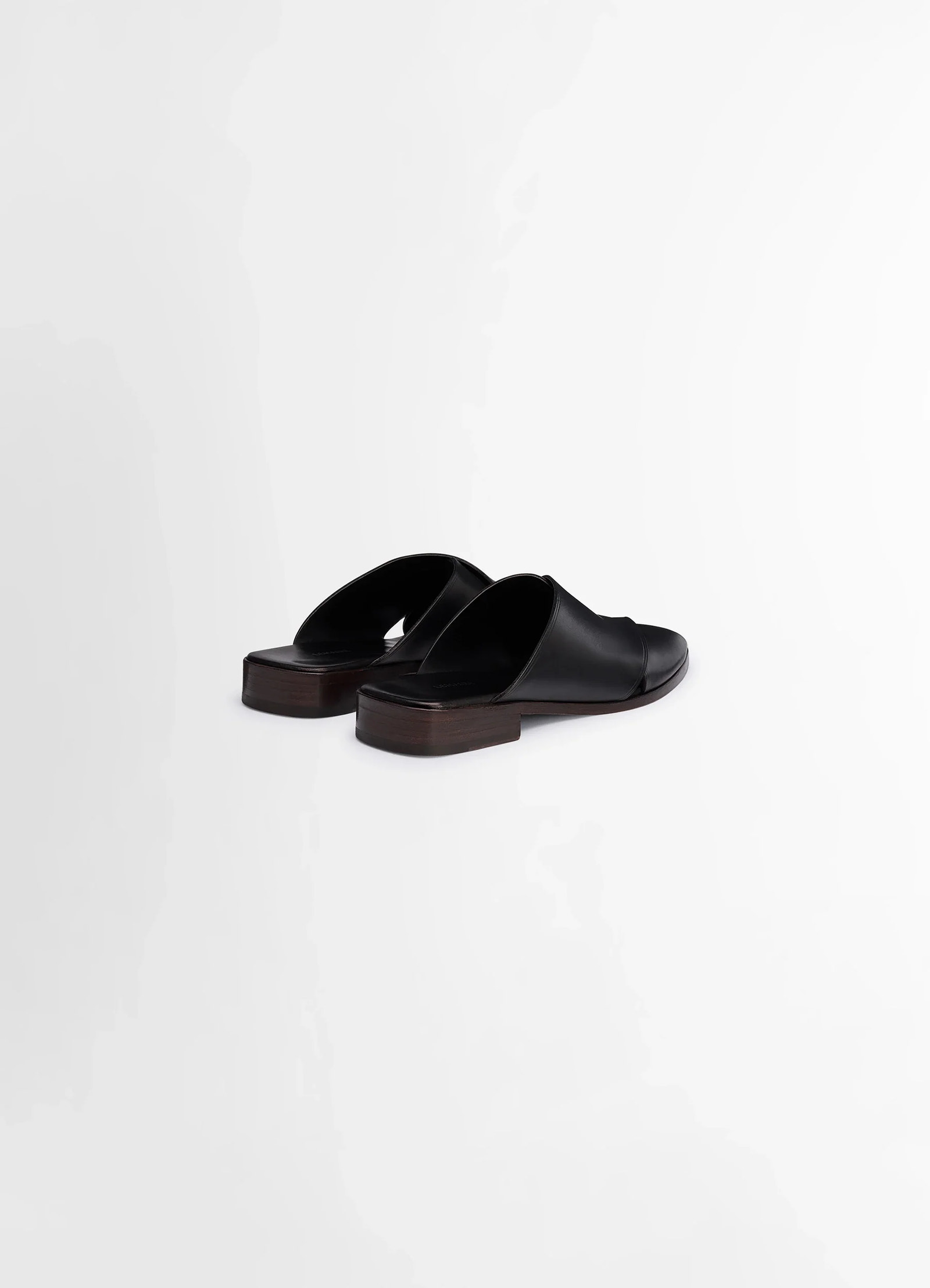 Lemaire cross flat sandals in soft shiny vegetable nappa, product shot, rear angle view slightly elevated heel