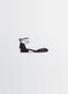 Micro Ballerina Flat in Black Supple Leather, product shot, Side view Ankle strap detail