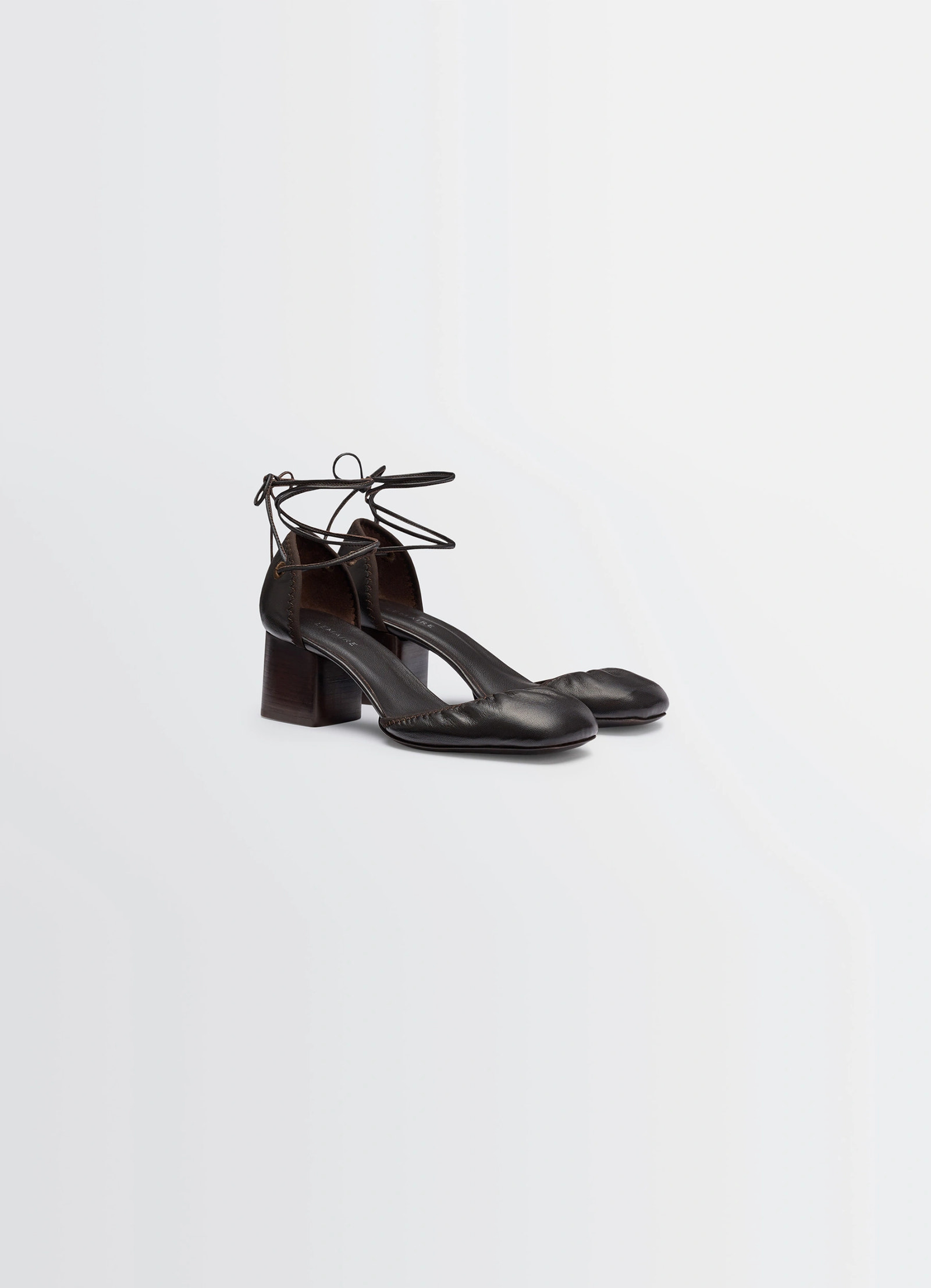 Micro ballerina 55 in black supple leather, product shot, back view open heel design