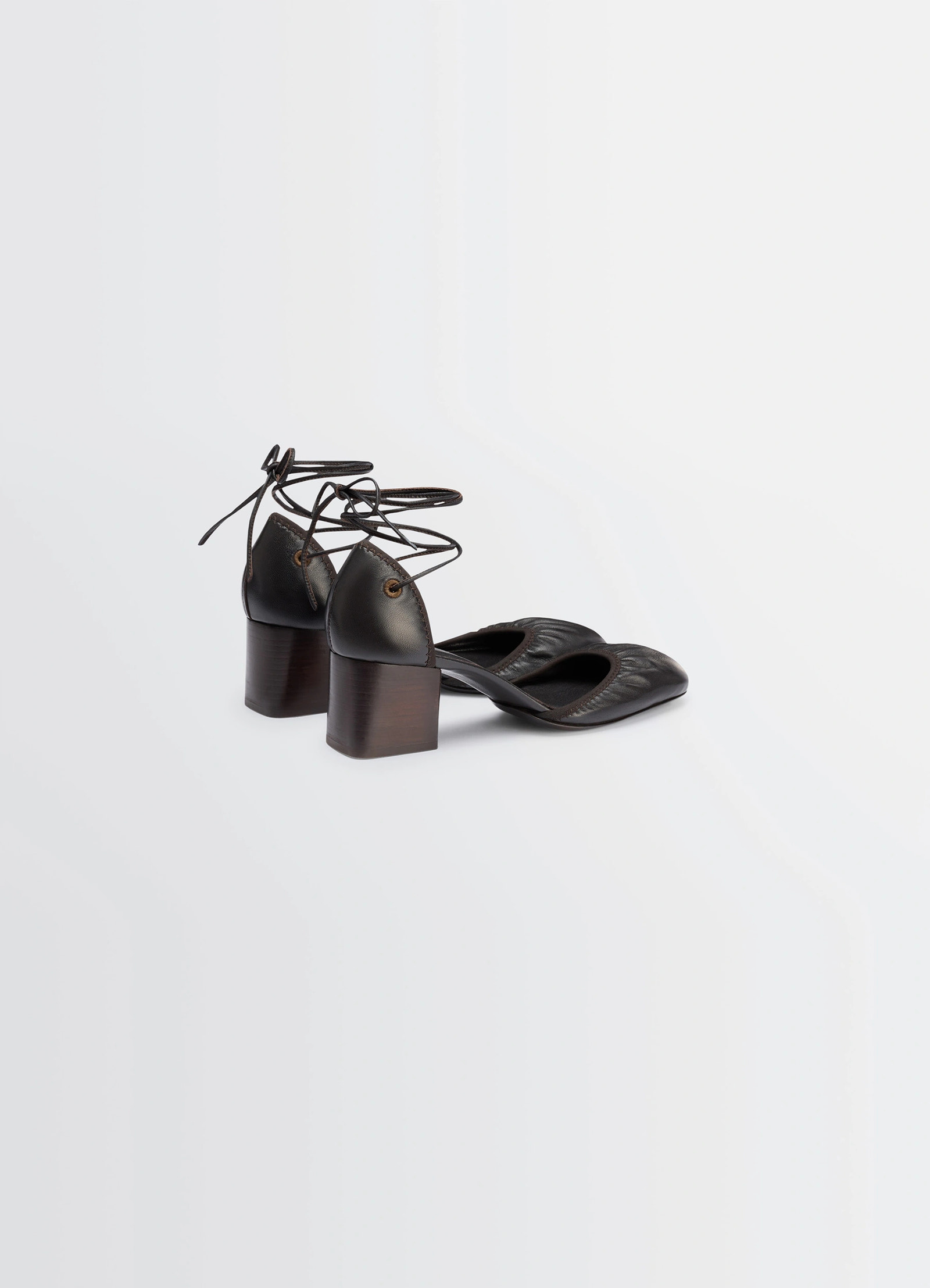 Micro ballerina 55 in black supple leather, product shot, angled top view lace-up detail visible