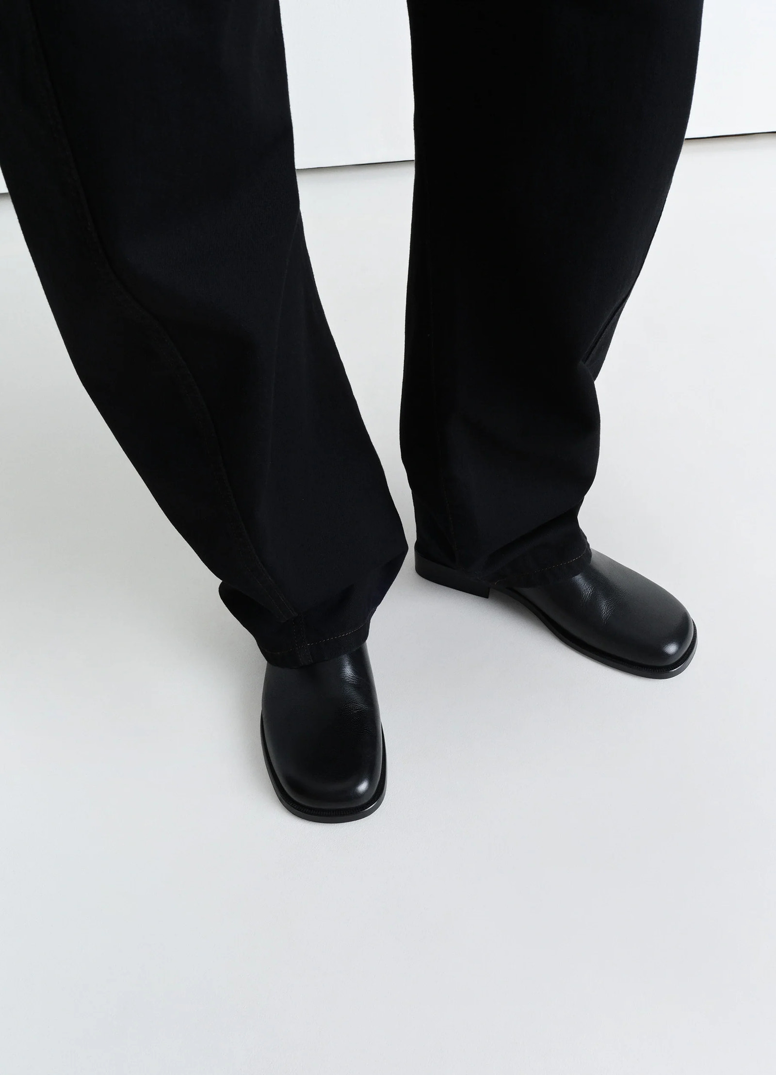 Lemaire anatomic slip on in glossy buffalo leather, model shot, top view elasticated easy fit