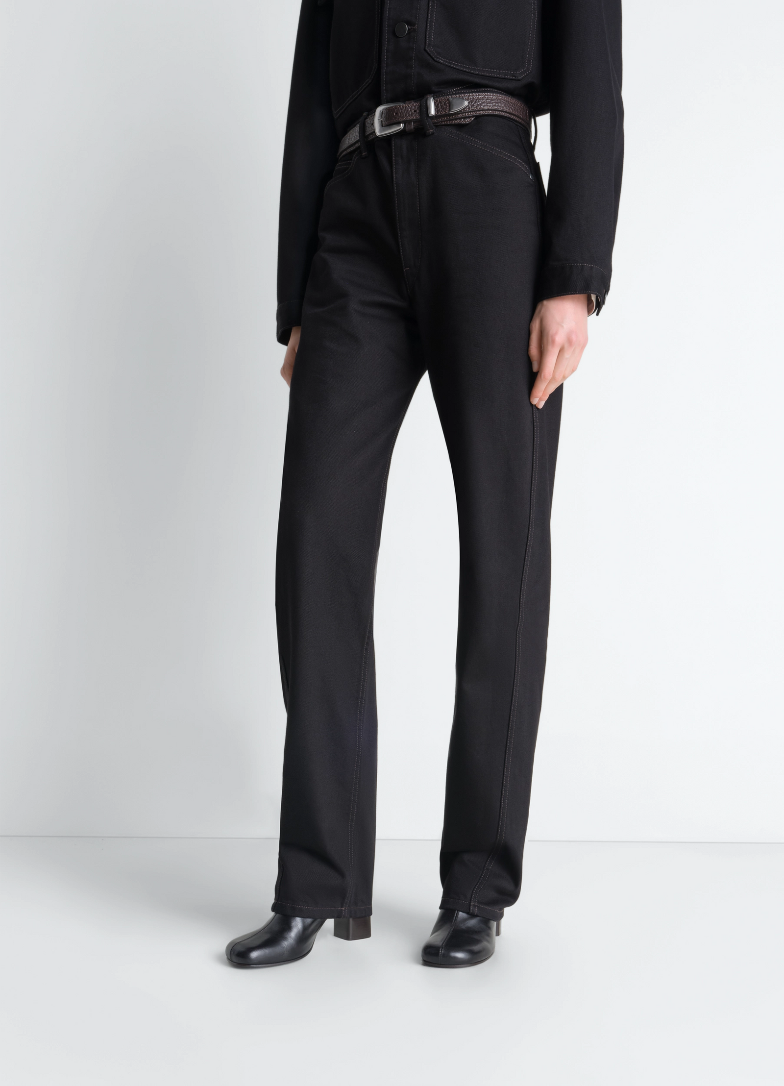 Lemaire anatomic boots in glossy vegetable-tanned leather, model shot, front view worn with black trousers