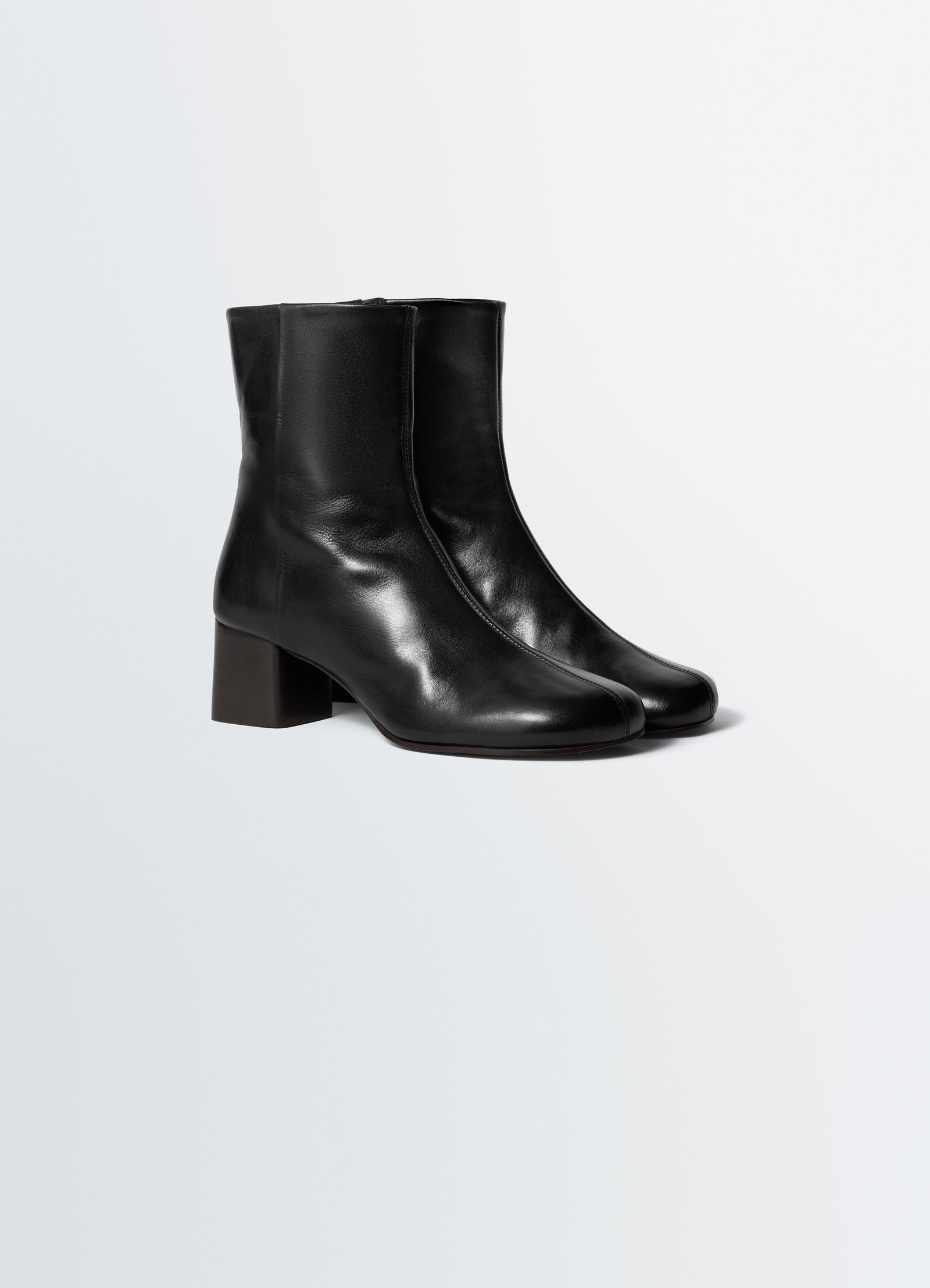 Lemaire black leather anatomic boots with 55mm block heel side view on plain white background