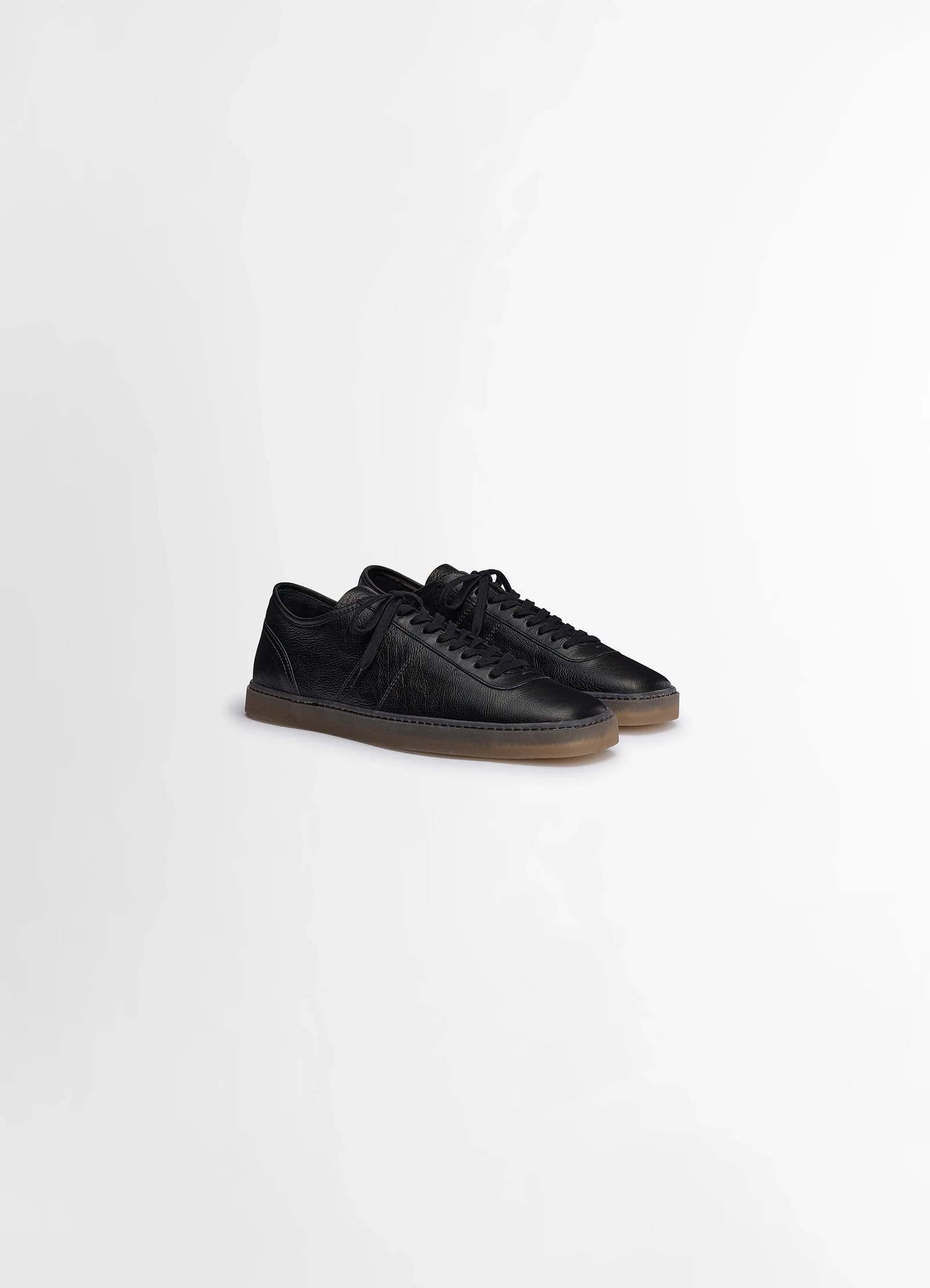 Linoleum laced up trainers in black smooth cow leather, product shot, angled front view dual lace style
